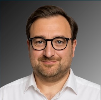 About Us Dr. Tom Vöge